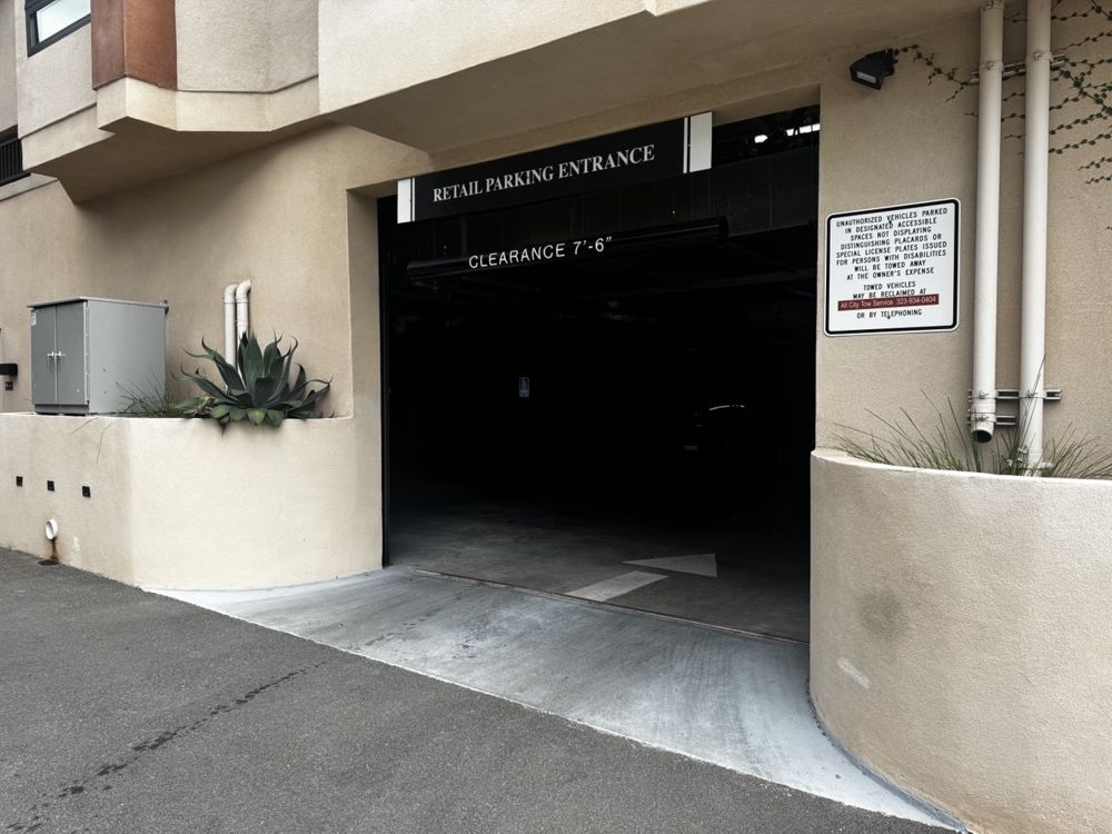 Garage entrance with Retail Parking Entrance sign